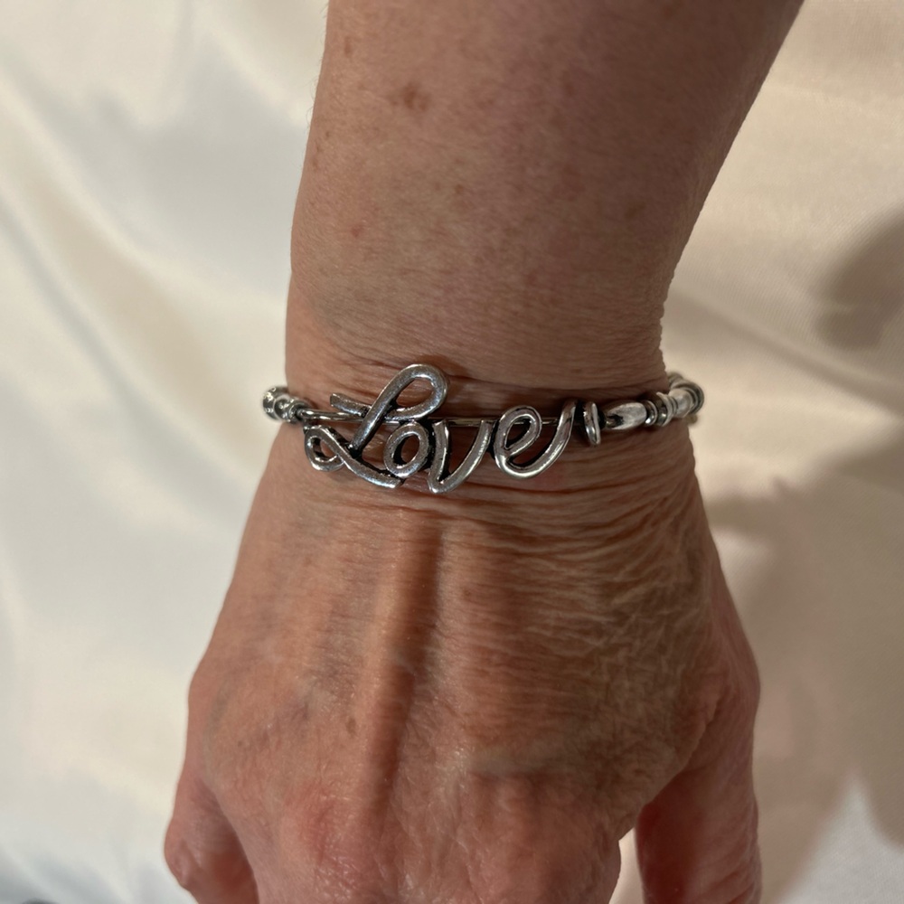 Gently used ALEX AND ANI wrap around bracelet in silver